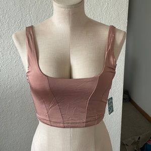 It’s a small bra pink clay color brand name intimately free people
